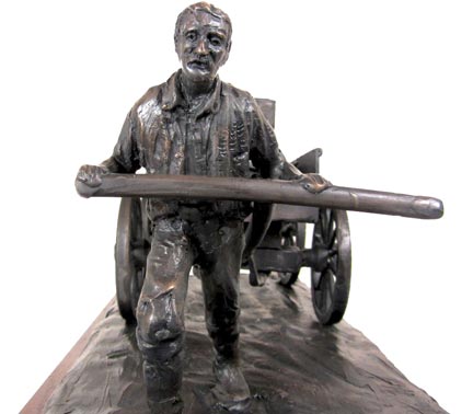 Man pulling 1800's Buckboard Wagon bronze statue 3